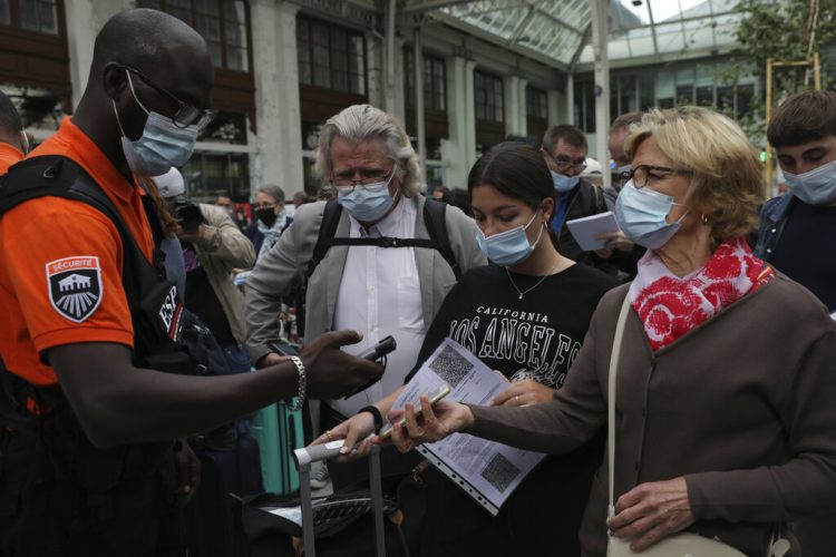 Mon. 9:15 a.m.: France's virus pass now required in restaurants, trains
